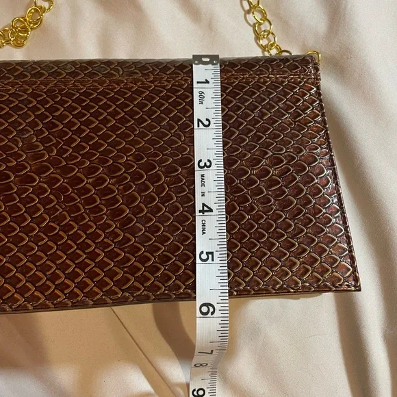 Bellini Gold Textured Clutch with Gold Chain and Bow Detail, OS - Picture 7 of 15